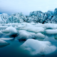 The watery edge of a glacier in west Greenland.